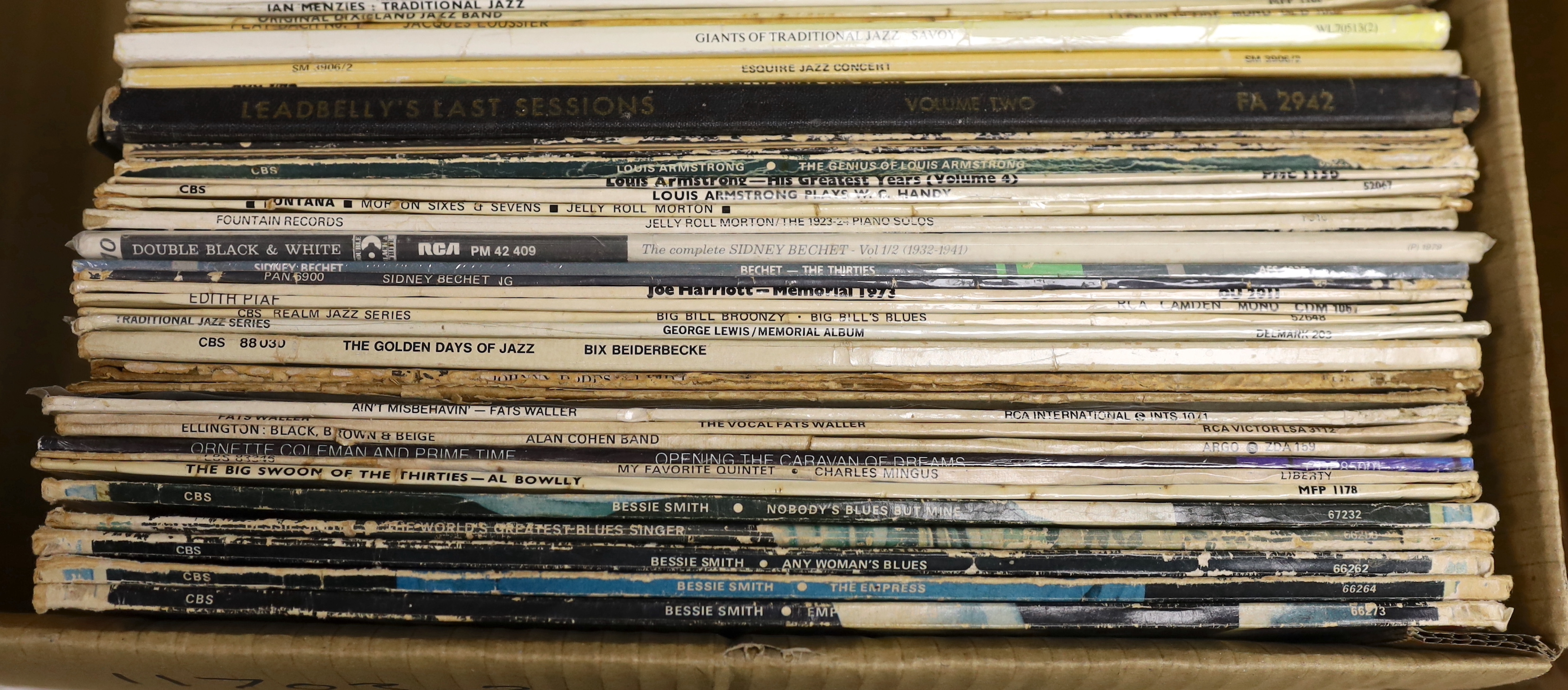 Forty-six Jazz LPs including, Bessie Smith, Charlie, Mingus, Ornette Coleman, Fats Waller, Bix Beiderbecke, Jelly Roll Morton, Louis Armstrong, Leadbelly, Ian Menzies, etc. together with six 10 inch LPs, etc.